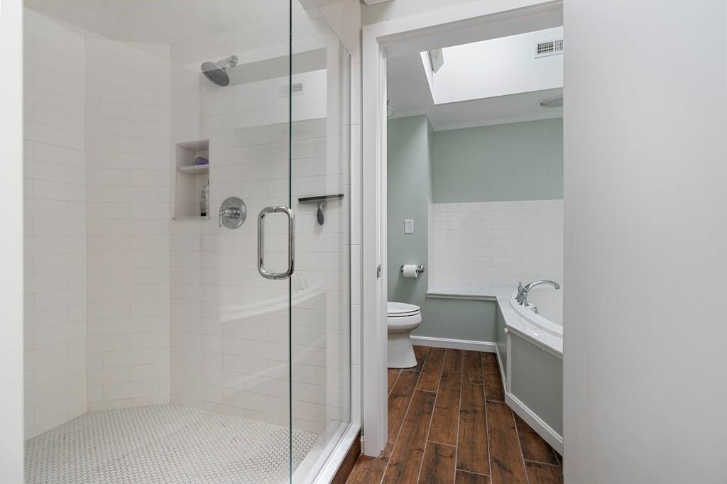 16 Standish Road Wayland, MA 01778 - Photo 14 of 22 a bathroom with a shower and a toilet