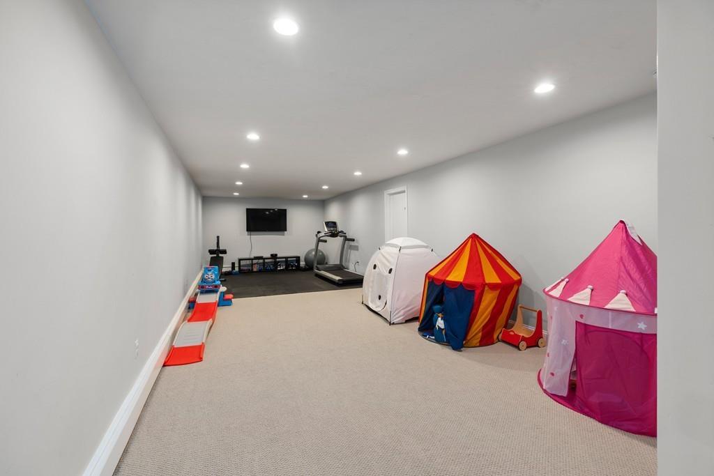 16 Standish Road Wayland, MA 01778 - Photo 19 of 22 a room with lots of white furniture and walls