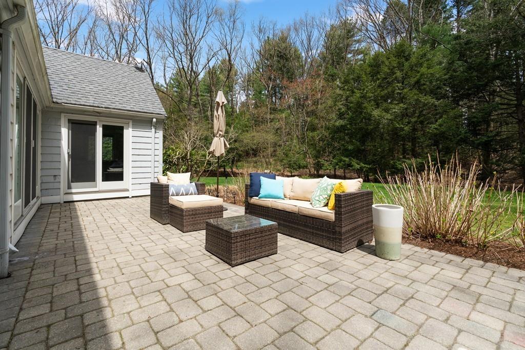 16 Standish Road Wayland, MA 01778 - Photo 21 of 22 a view of a house with backyard and sitting area