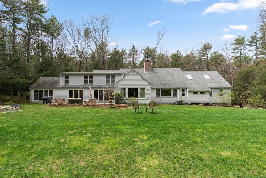 16 Standish Road Wayland, MA 01778 - Photo 22 of 22 a house with garden in front of it