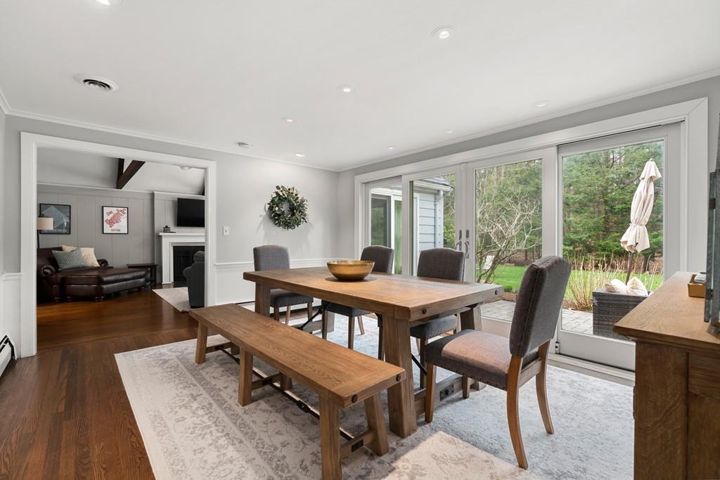 16 Standish Road Wayland, MA 01778 - Photo 6 of 22 a living room with furniture a table and a large window