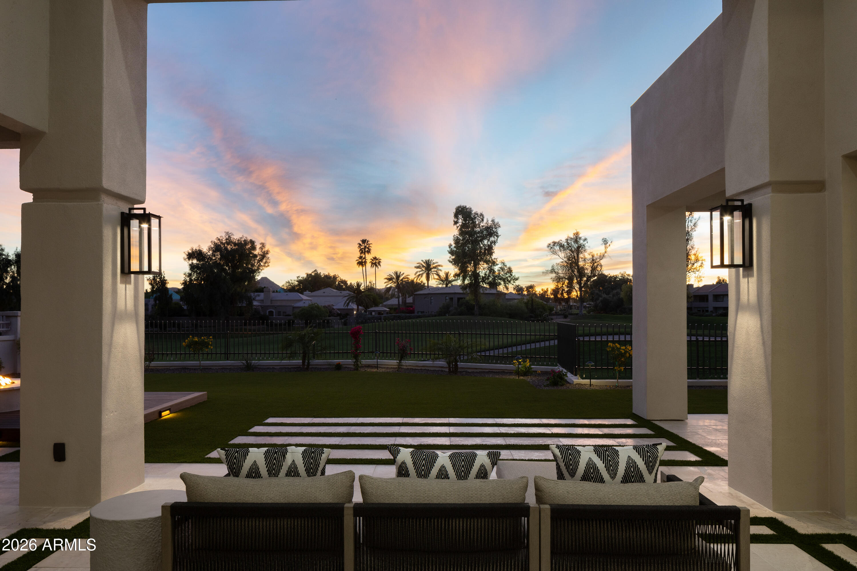 7878 East Gainey Ranch Road, Unit 14 Scottsdale, AZ 85258 - Photo 11 of 40 a view of a roof deck with couches and wooden floor