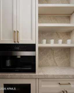 a kitchen with kitchen island granite countertop a sink cabinets and stainless steel appliances