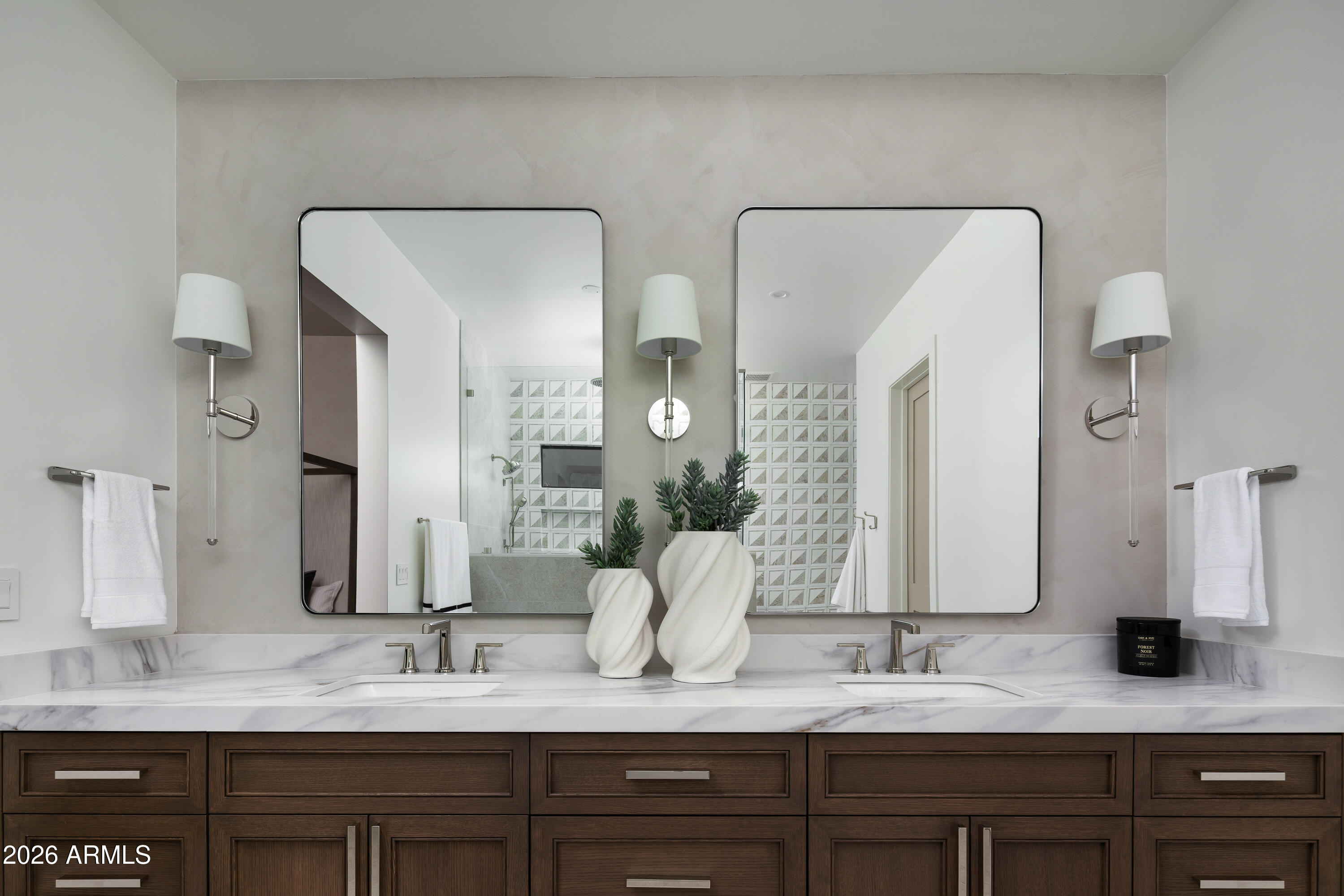 7878 East Gainey Ranch Road, Unit 14 Scottsdale, AZ 85258 - Photo 18 of 40 a bathroom with double vanity sinks and a mirror
