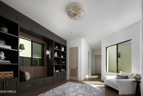 a living room with shelf