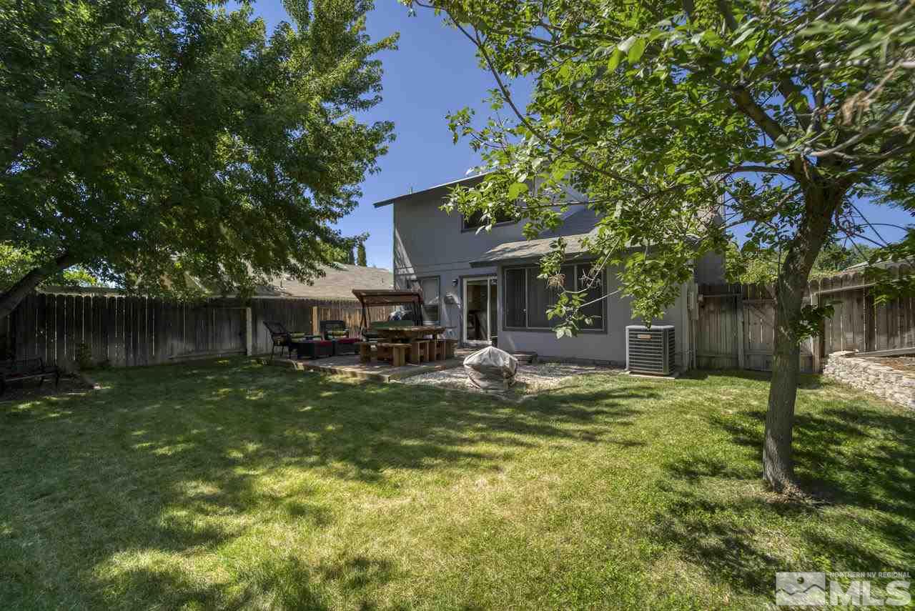 1296 Canyon Creek Road Reno, NV 89523 - Photo 22 of 32 a view of a house with backyard porch and sitting area