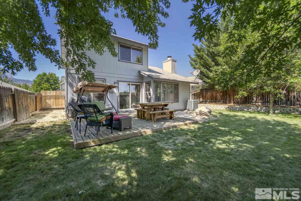 1296 Canyon Creek Road Reno, NV 89523 - Photo 23 of 32 a view of a house with a yard porch and sitting area