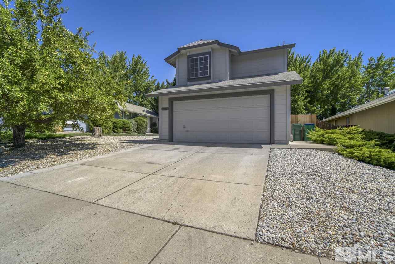 1296 Canyon Creek Road Reno, NV 89523 - Photo 26 of 32 a front view of a house with a yard