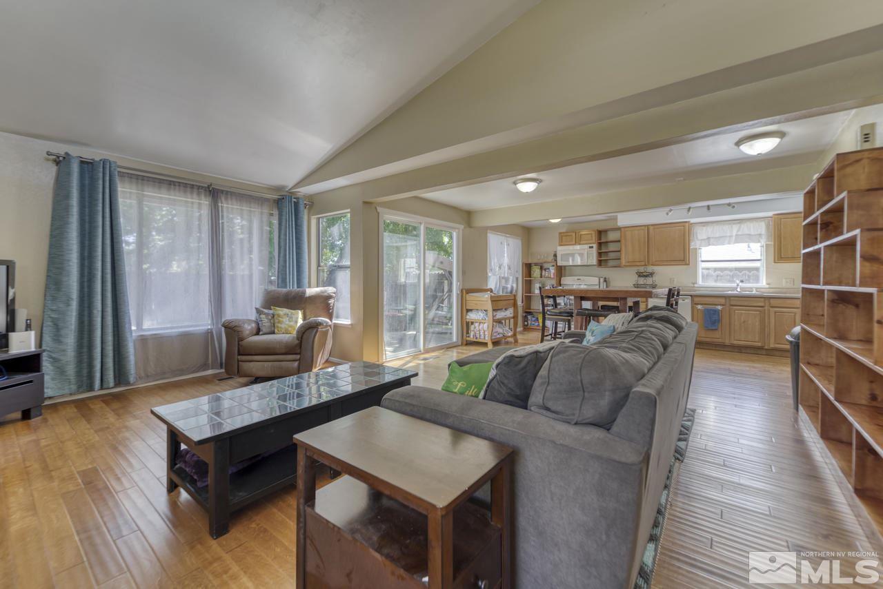 1296 Canyon Creek Road Reno, NV 89523 - Photo 27 of 32 a living room with furniture and a table