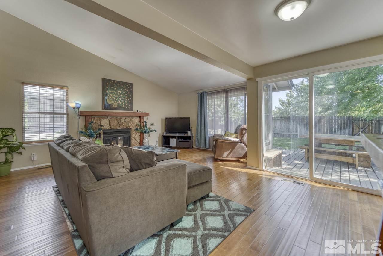 1296 Canyon Creek Road Reno, NV 89523 - Photo 6 of 32 a living room with furniture and a fireplace