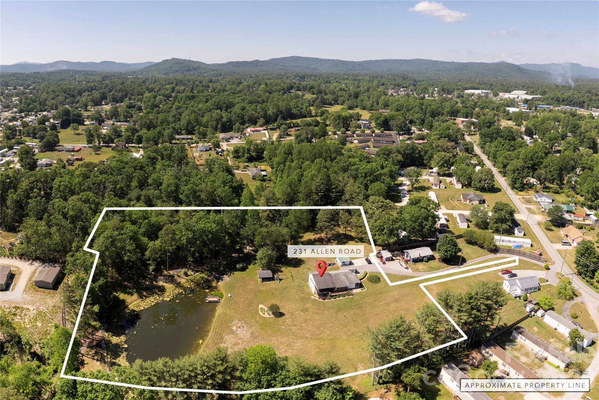231 Allen Road East Flat Rock, NC 28726 - Photo 42 of 42 a view of a lake with a mountain
