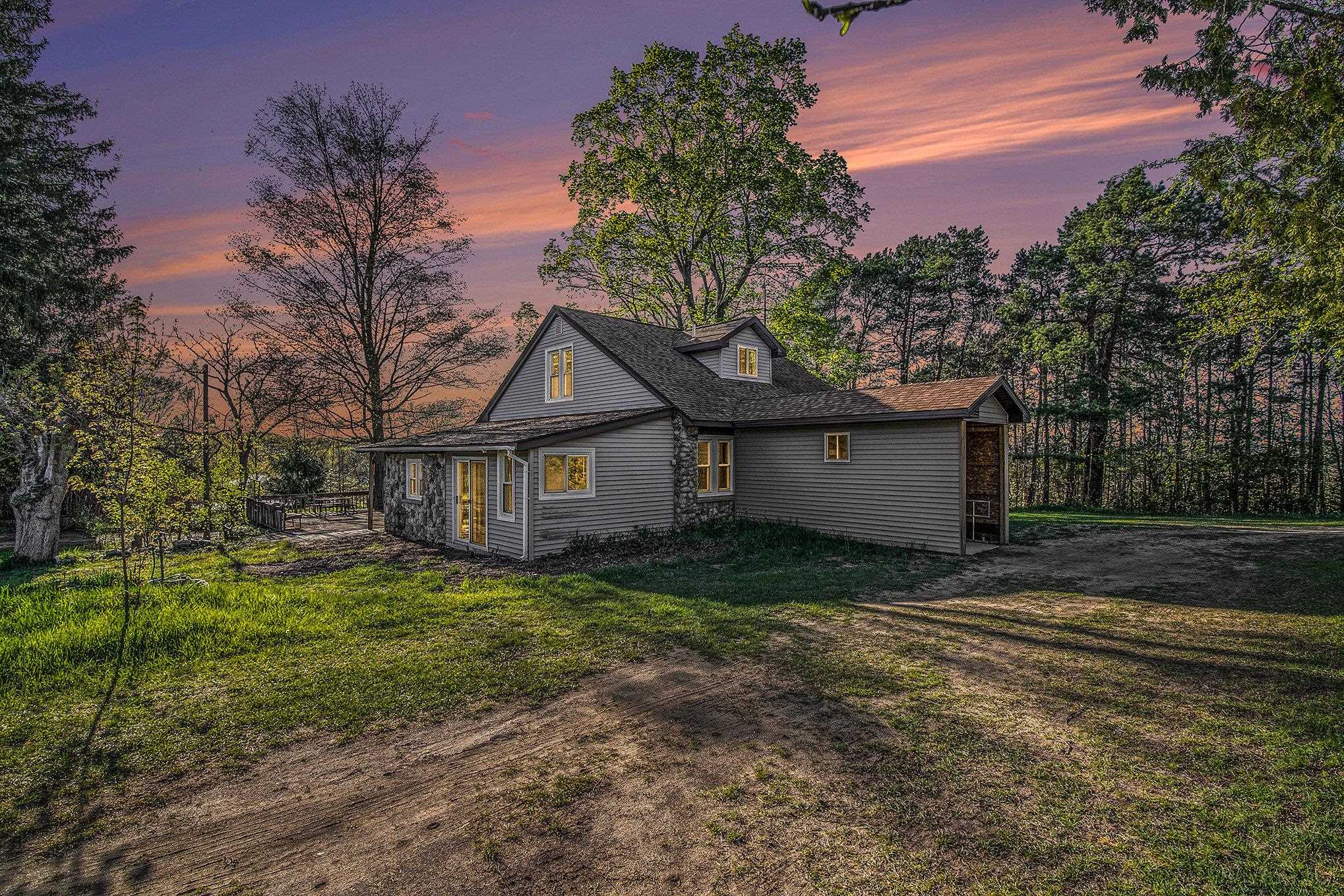 8029 Homestead Road Benzonia, MI 49616 - Photo 1 of 46