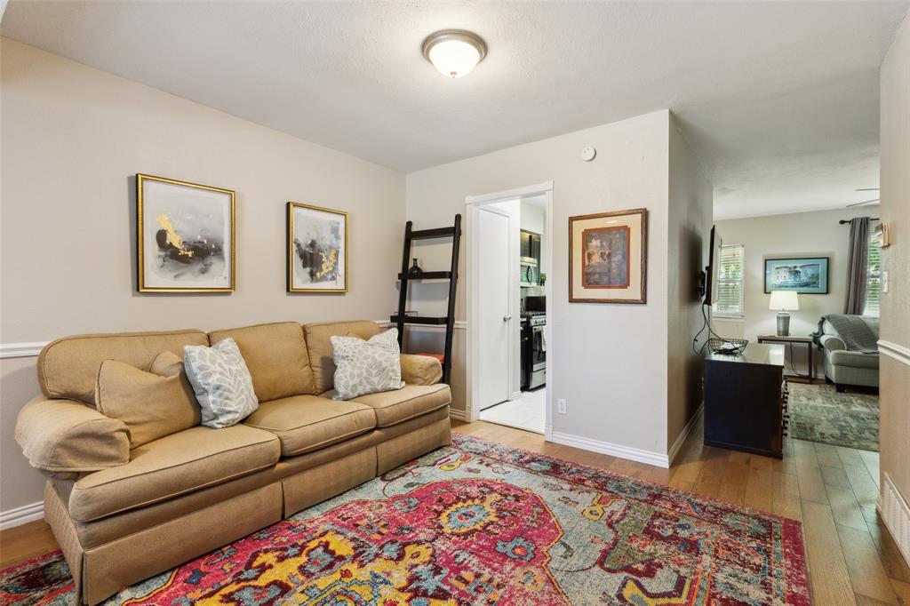 1202 Johns Drive Euless, TX 76039 - Photo 5 of 26 a living room with furniture and a couch