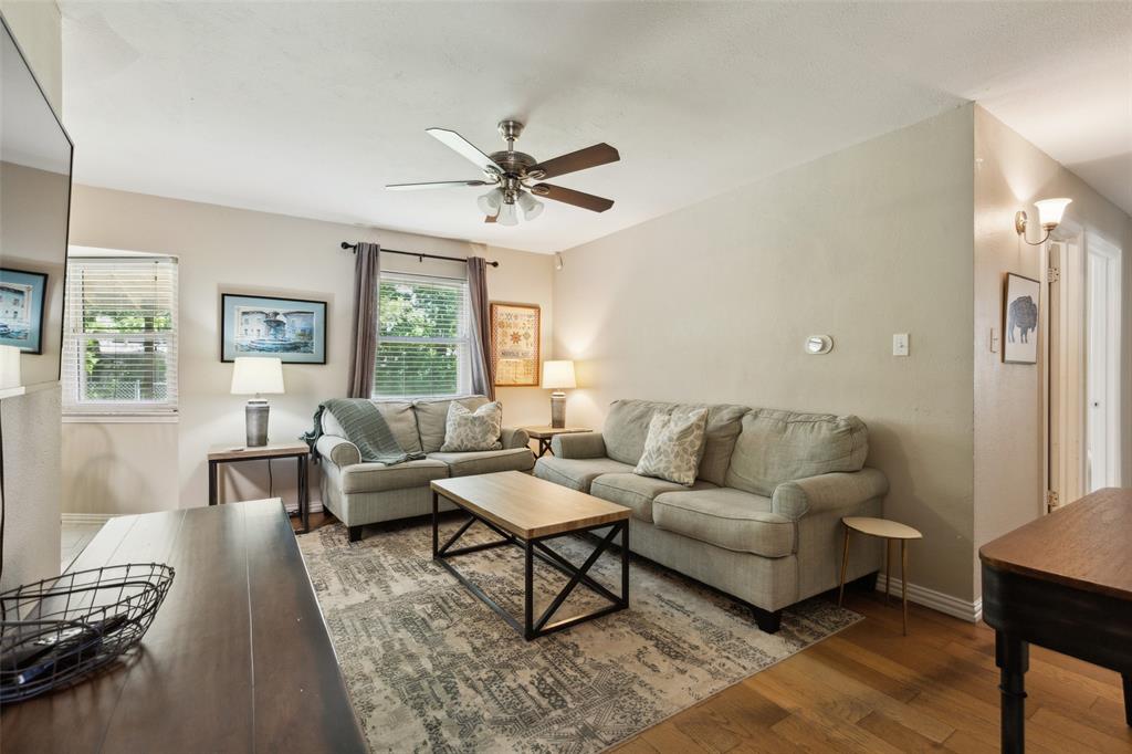 1202 Johns Drive Euless, TX 76039 - Photo 7 of 26 a living room with furniture and a window