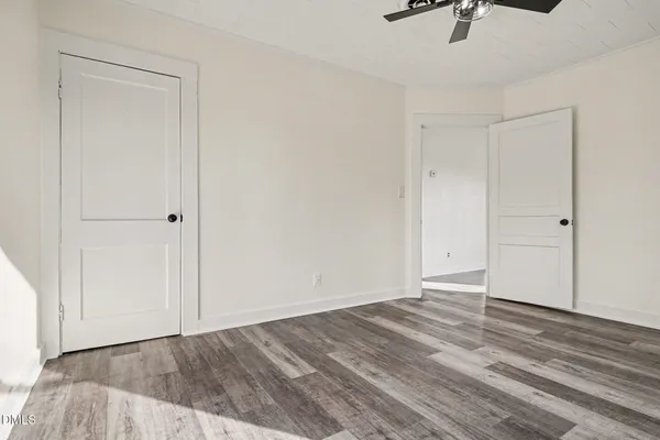 a view of room with hardwood floor