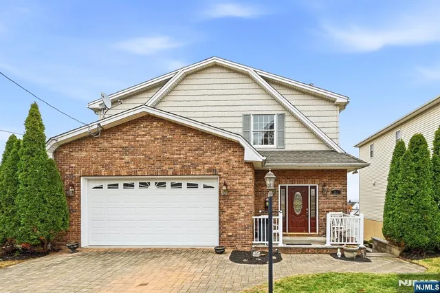 a view of a house with garage