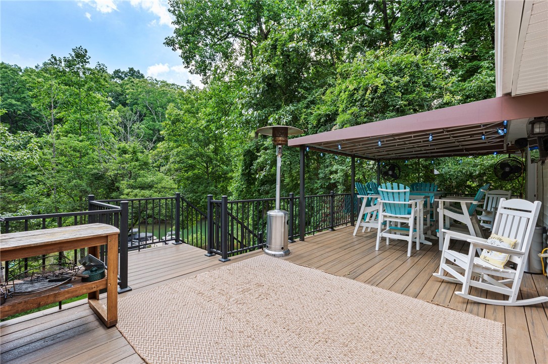 322 Shorecrest Drive Seneca, SC 29672 - Photo 25 of 30 Enjoy tranquil moments and verdant views from this inviting outdoor deck.