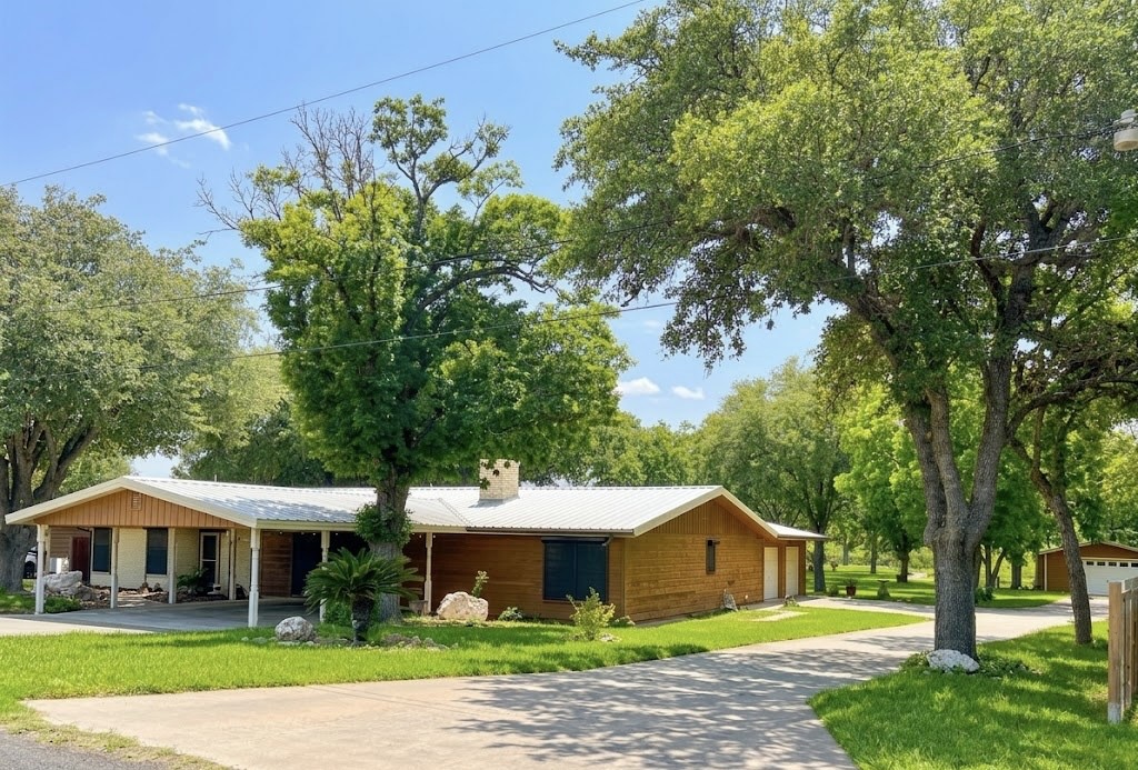 a aerial view of a house with a yard