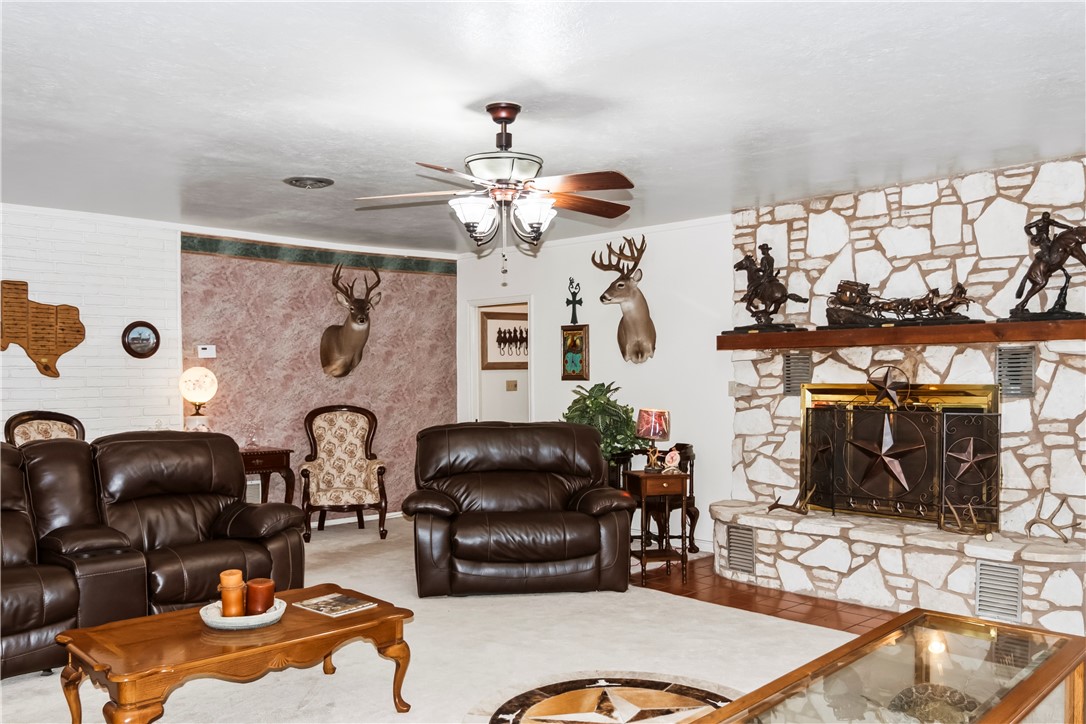 155 Harbor Circle Mathis, TX 78368 - Photo 23 of 40 a living room with furniture and a flat screen tv