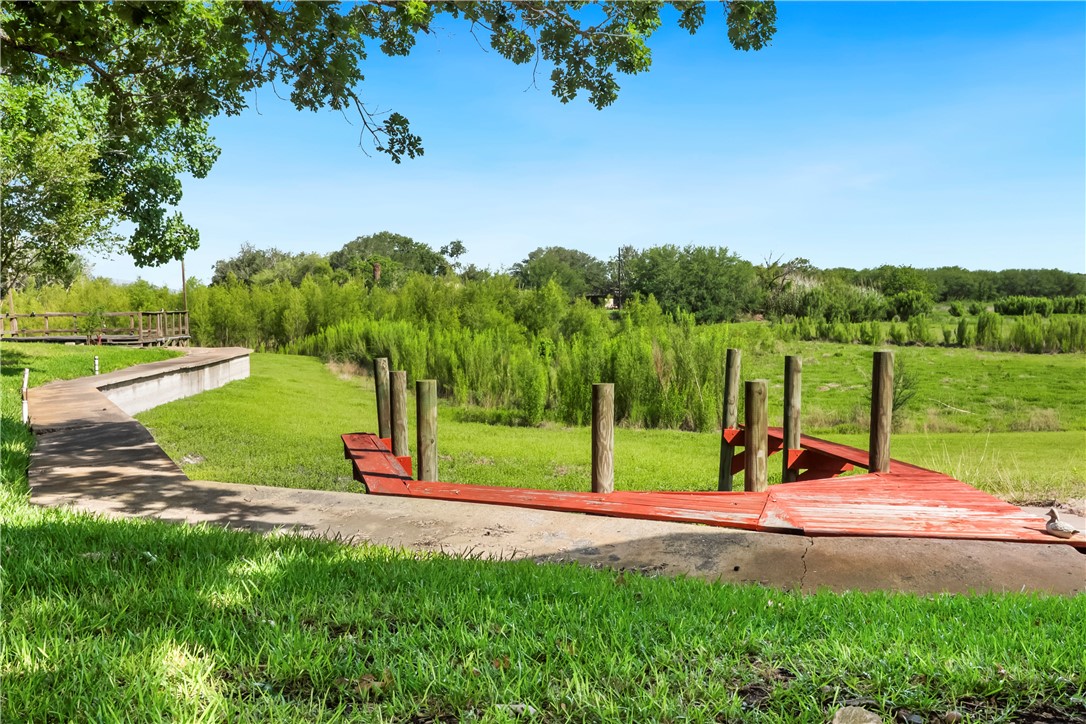 155 Harbor Circle Mathis, TX 78368 - Photo 4 of 40 a view of a park with large trees