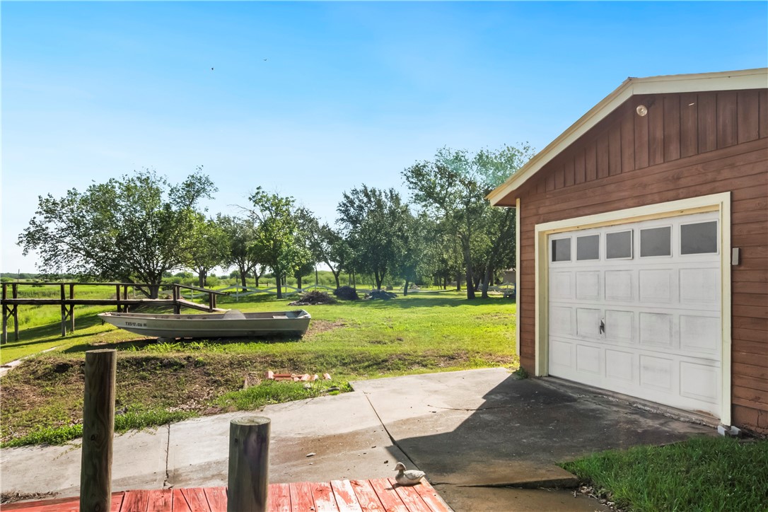 155 Harbor Circle Mathis, TX 78368 - Photo 5 of 40 a view of a house with a yard