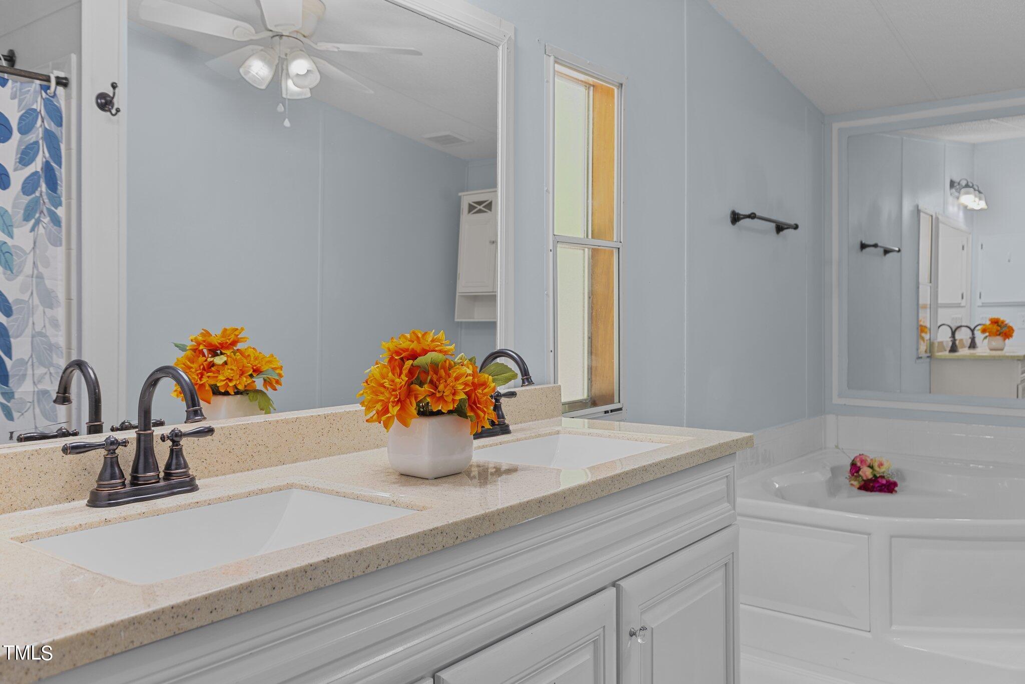 120 Graham Day Road Roxboro, NC 27574 - Photo 35 of 71 Beautiful countertops in primary bathroom