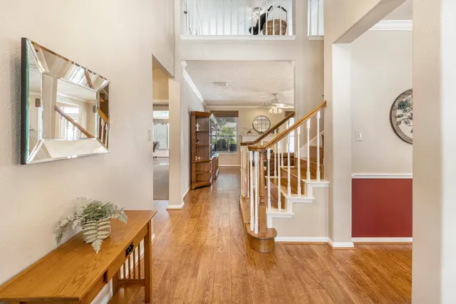 a view of entryway with wooden floor