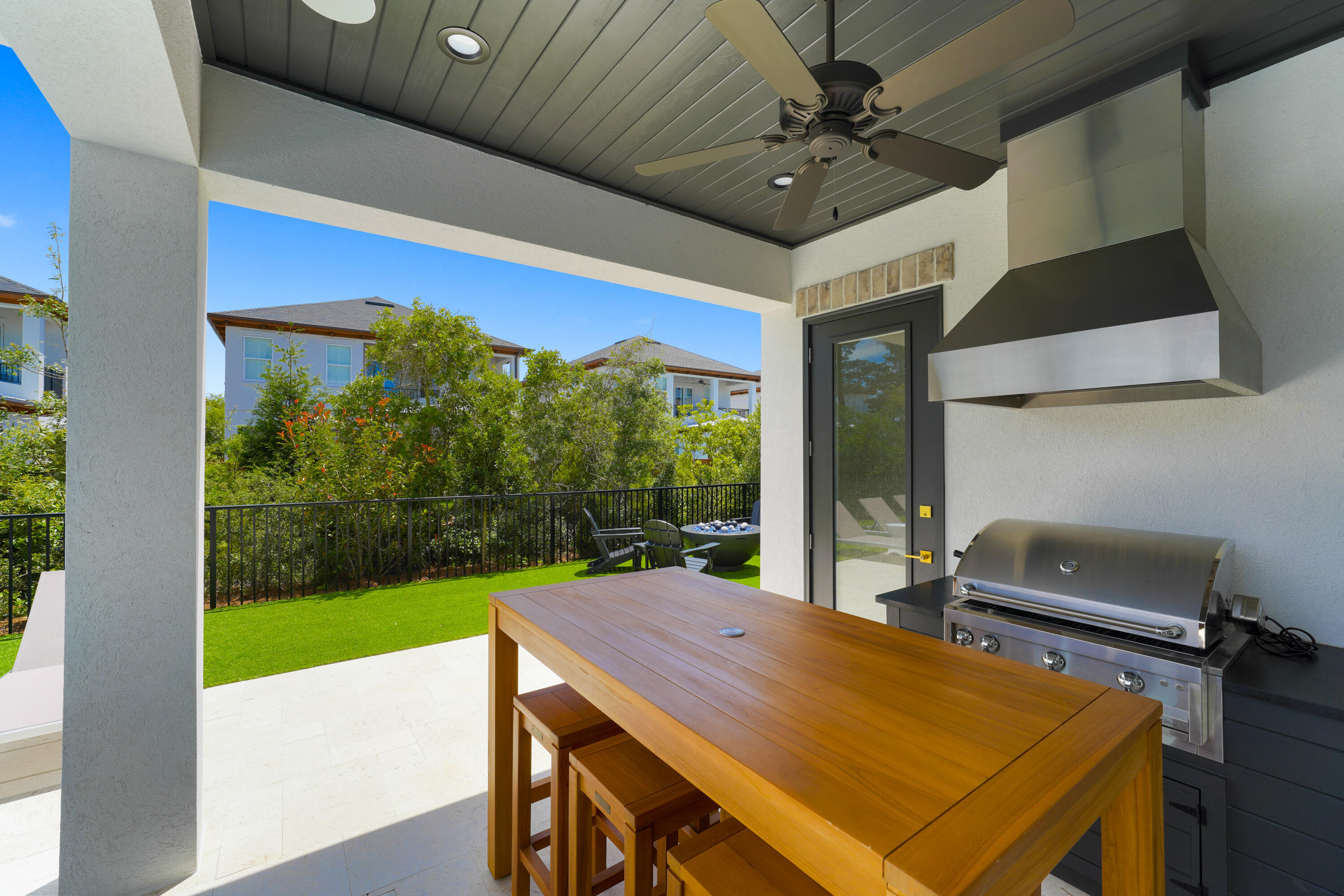 56 Sea Croft Cove Santa Rosa Beach, FL 32459 - Photo 11 of 65 a view of a patio with a table and chairs