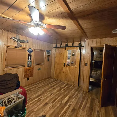 a bathroom with a shower and a sink