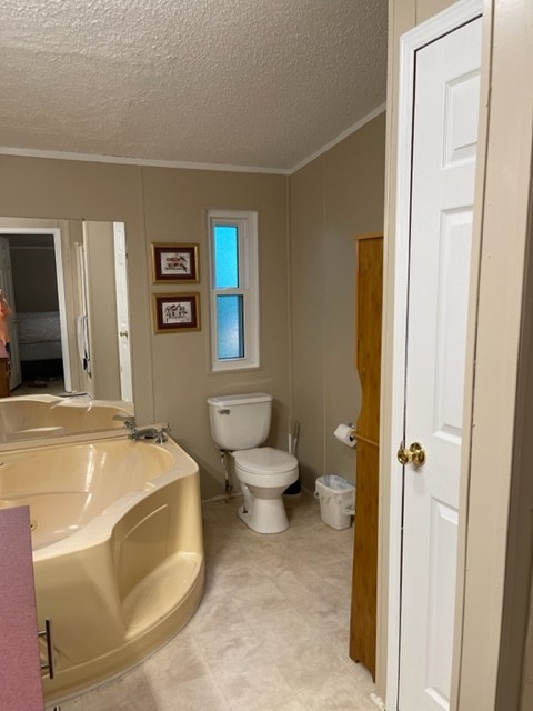10047 Judy Road Lyles, TN 37098 - Photo 15 of 32 a bathroom with a sink toilet and shower