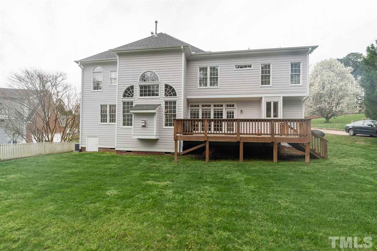 5209 Tallowtree Drive Raleigh, NC 27613 - Photo 22 of 22 a view of a house with a yard