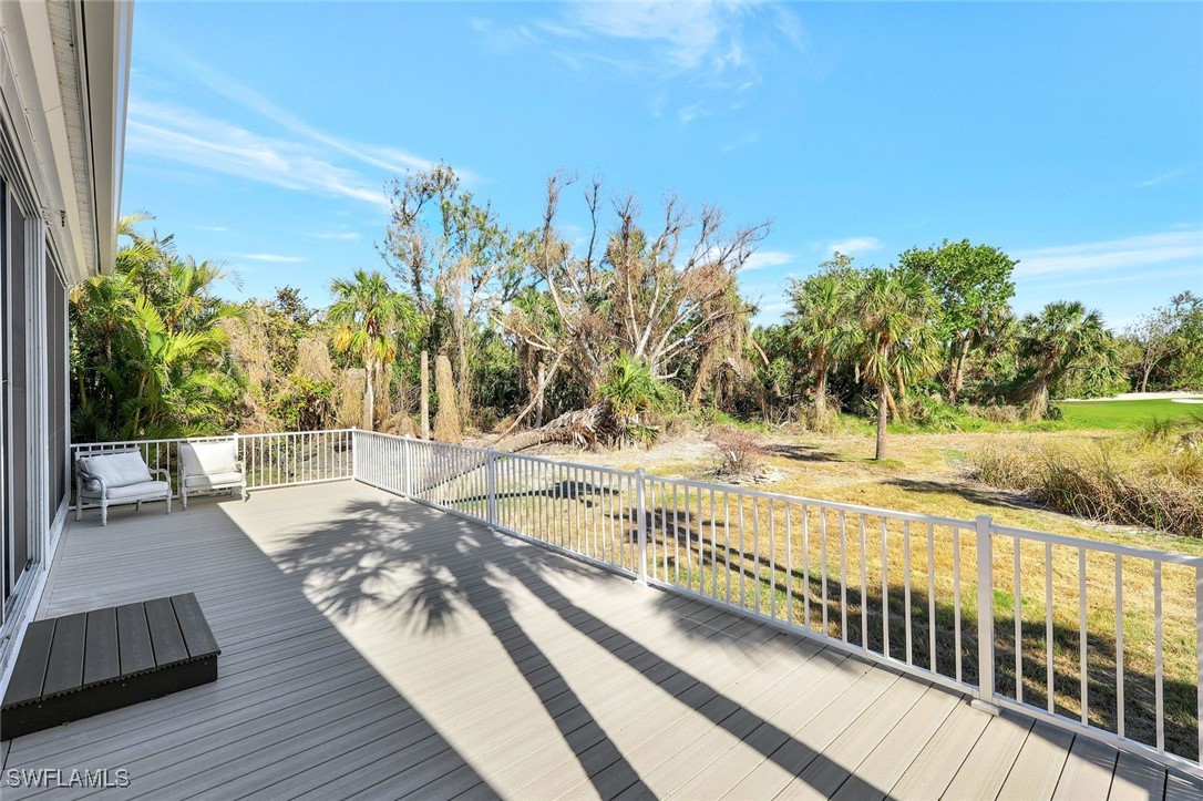 2450 Wulfert Road Sanibel, FL 33957 - Photo 42 of 44 a view of a balcony with trees
