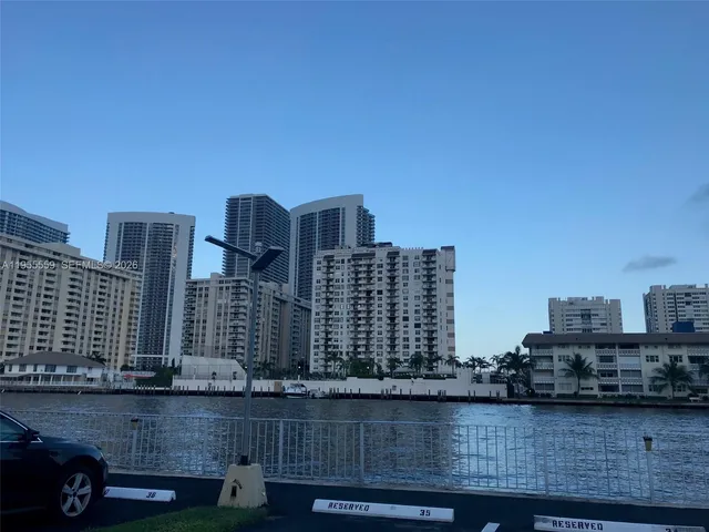 a view of a city with tall buildings