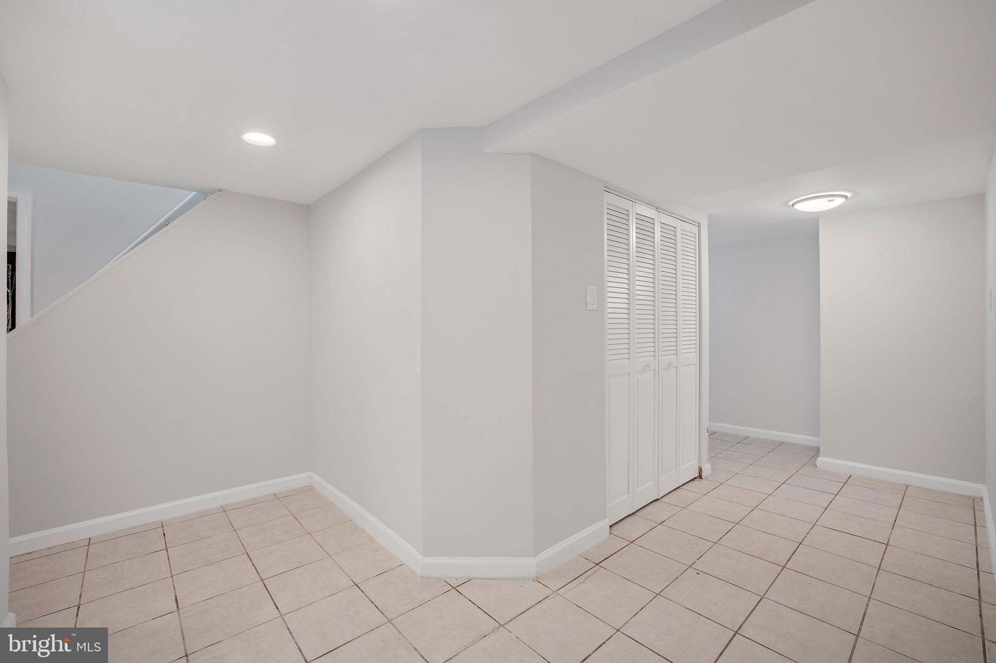6907 Riverdale Road Lanham, MD 20706 - Photo 17 of 18 Basement corridors...
