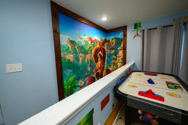 a room with toys and flat screen tv