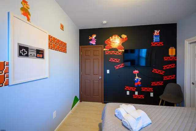 a bedroom with a bed and a closet