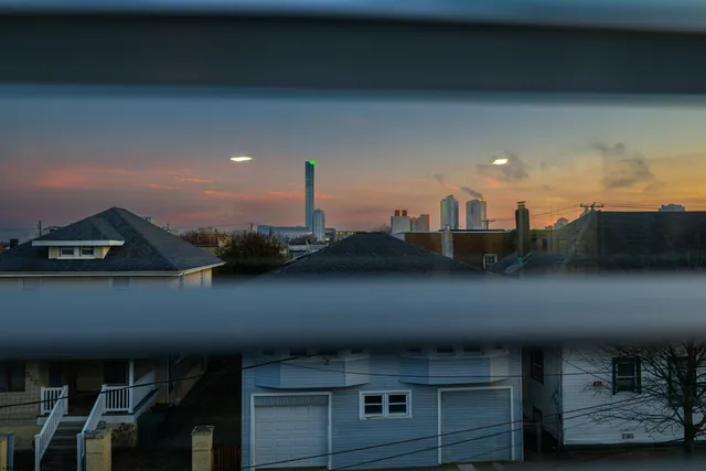 a view of roof deck with seating area