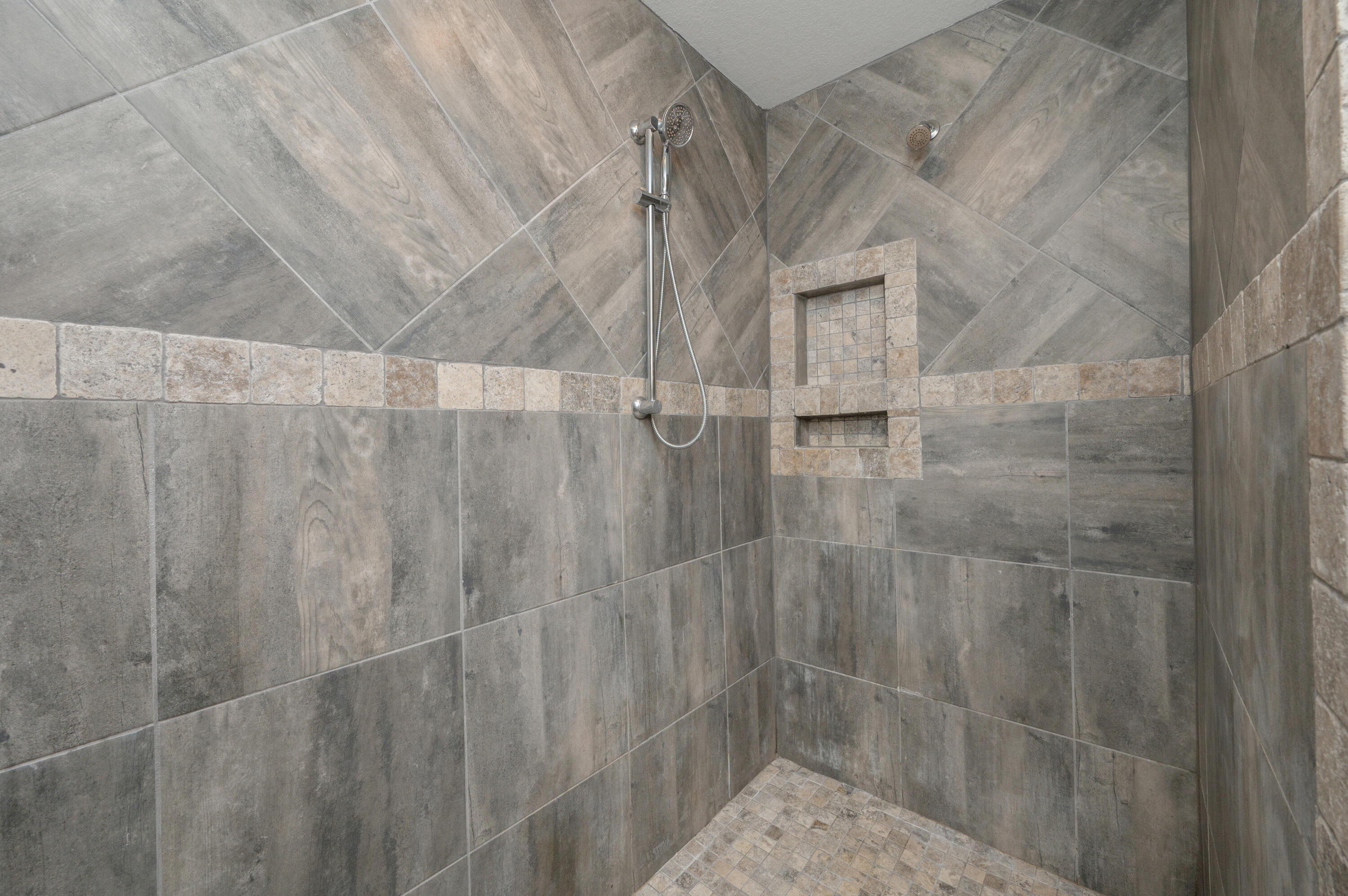 5662 North Brook Drive Crestview, FL 32539 - Photo 11 of 25 a bathroom with a shower