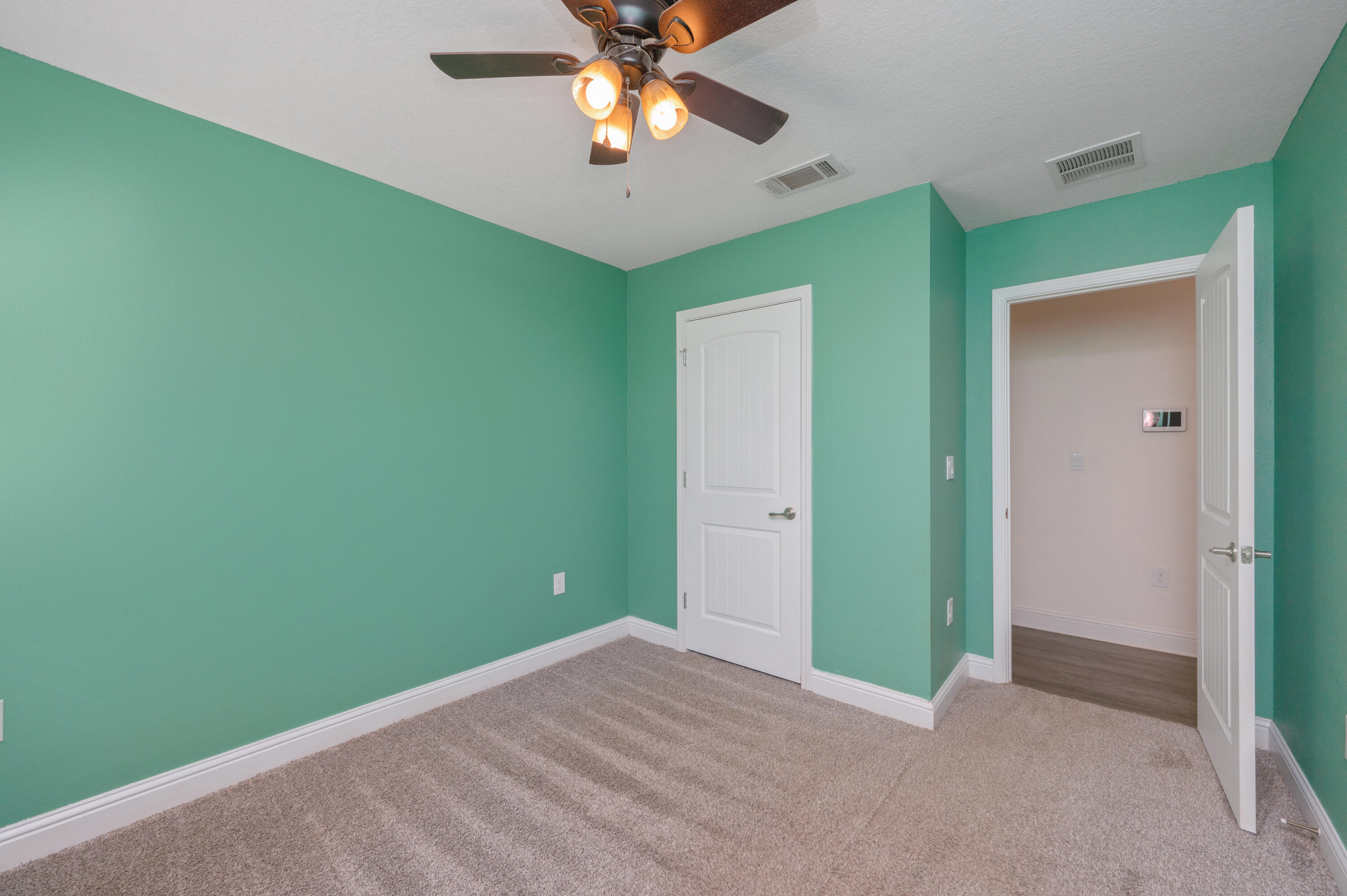 5662 North Brook Drive Crestview, FL 32539 - Photo 13 of 25 a view of a room with a fan and a fan