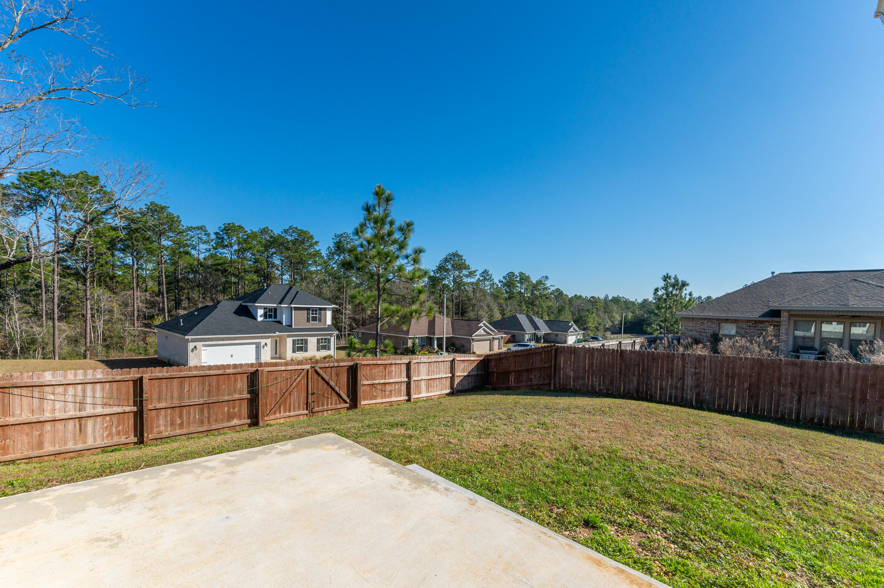 5662 North Brook Drive Crestview, FL 32539 - Photo 22 of 25 a view of a backyard