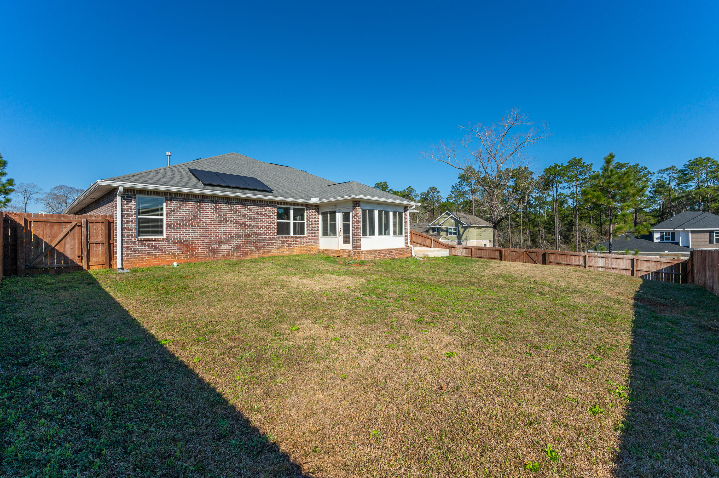 5662 North Brook Drive Crestview, FL 32539 - Photo 23 of 25 a view of a house with a yard