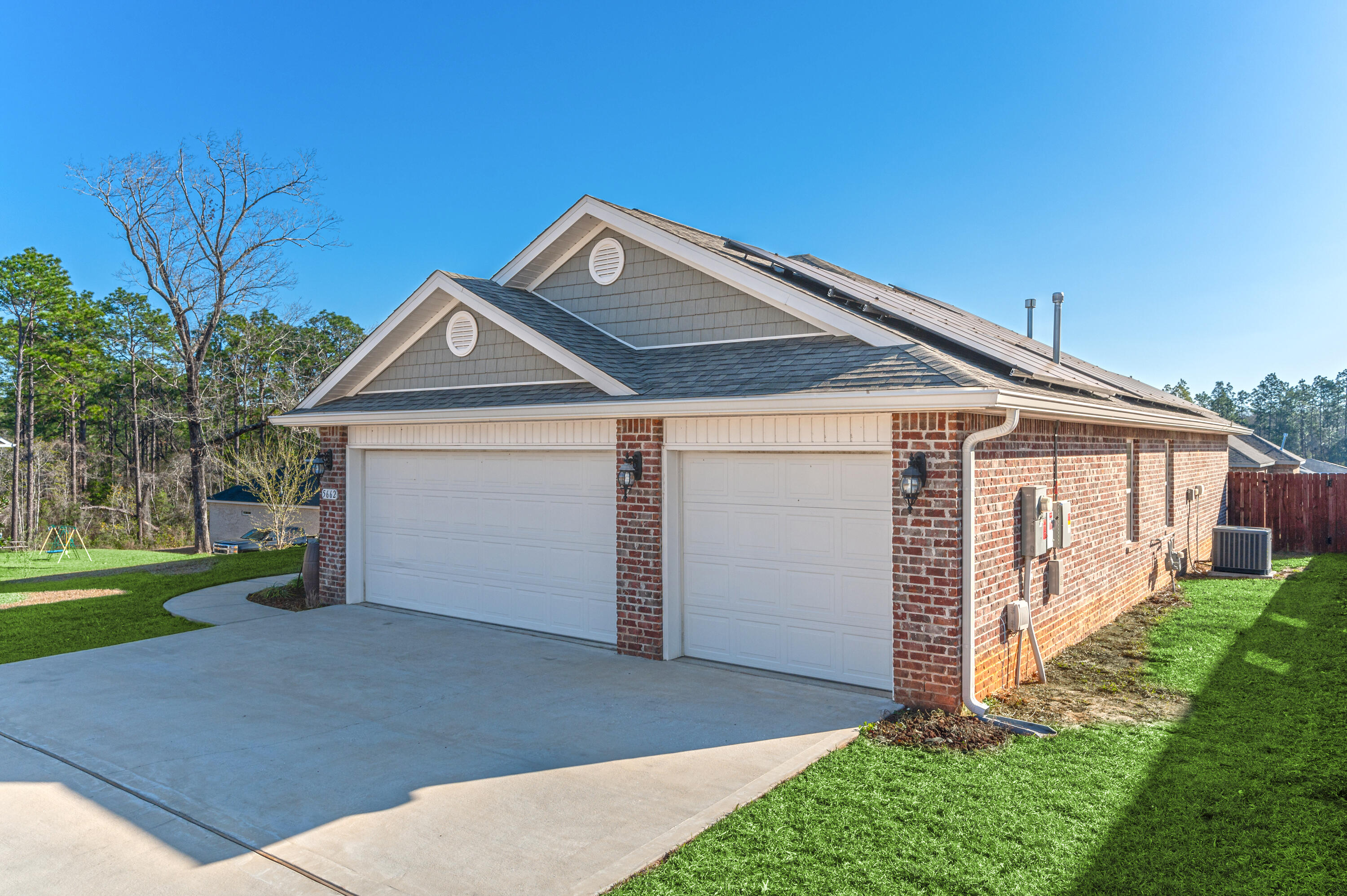 5662 North Brook Drive Crestview, FL 32539 - Photo 25 of 25 a front view of a house with garden