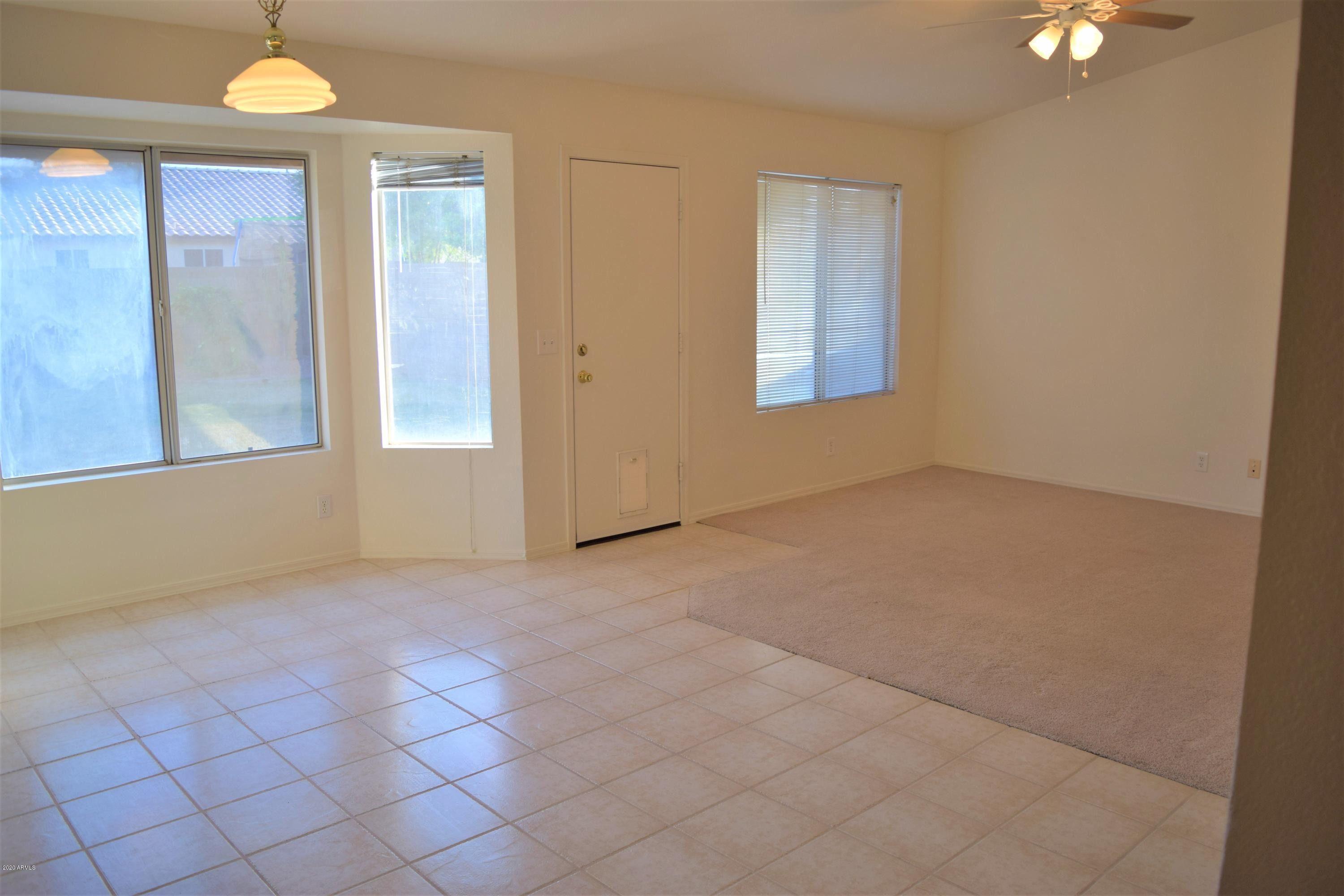 13323 East Butler Street Chandler, AZ 85225 - Photo 11 of 22 an empty room with windows