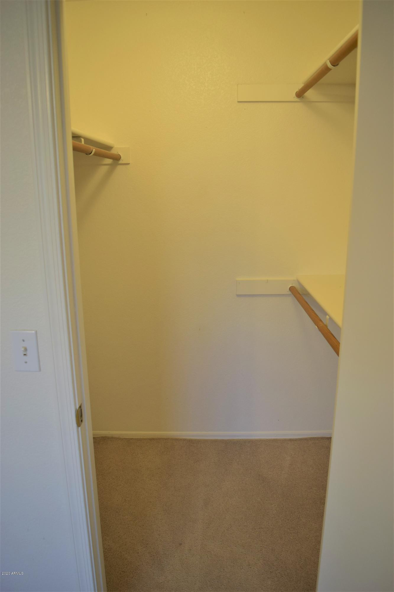 13323 East Butler Street Chandler, AZ 85225 - Photo 16 of 22 a view of small space with racks on the wall