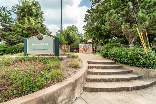 a swimming pool with outdoor seating and yard