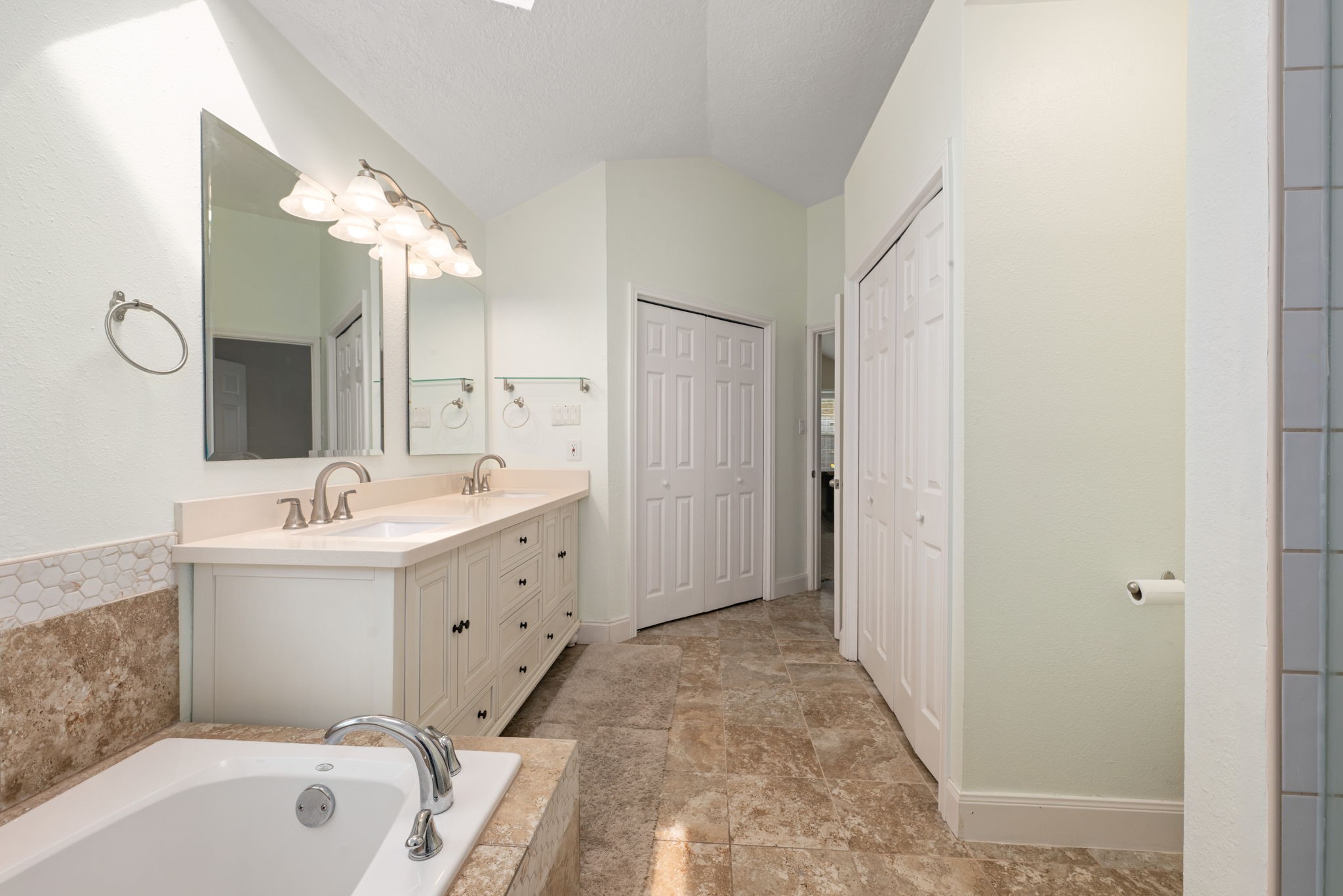 1915 Mercoal Drive Spring, TX 77386 - Photo 20 of 50 Well-appointed primary bath featuring dual sinks, generous storage, and a functional layout.
