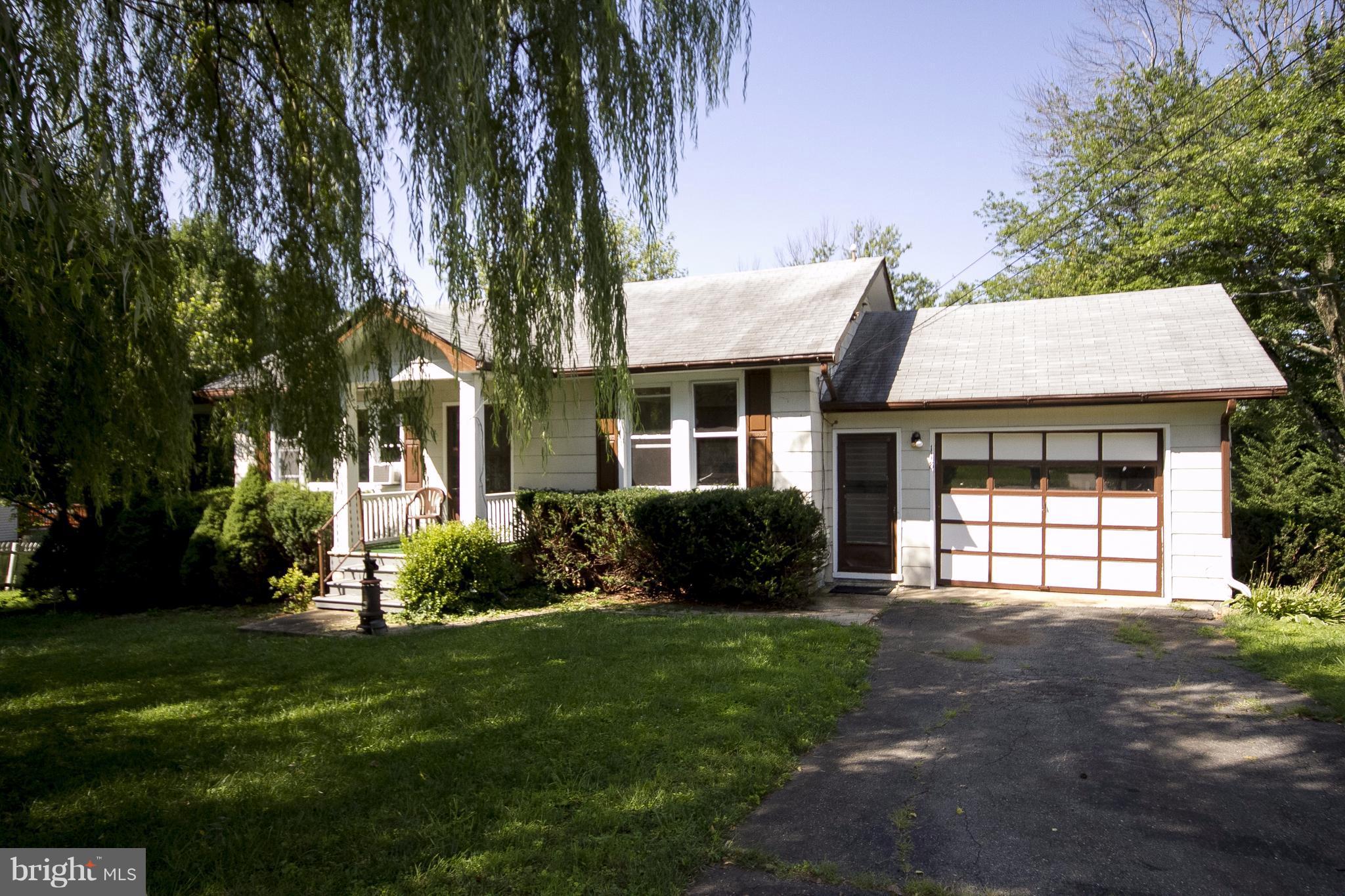 118 Byway Road Owings Mills, MD 21117 - Photo 2 of 25 a view of a house with a garden