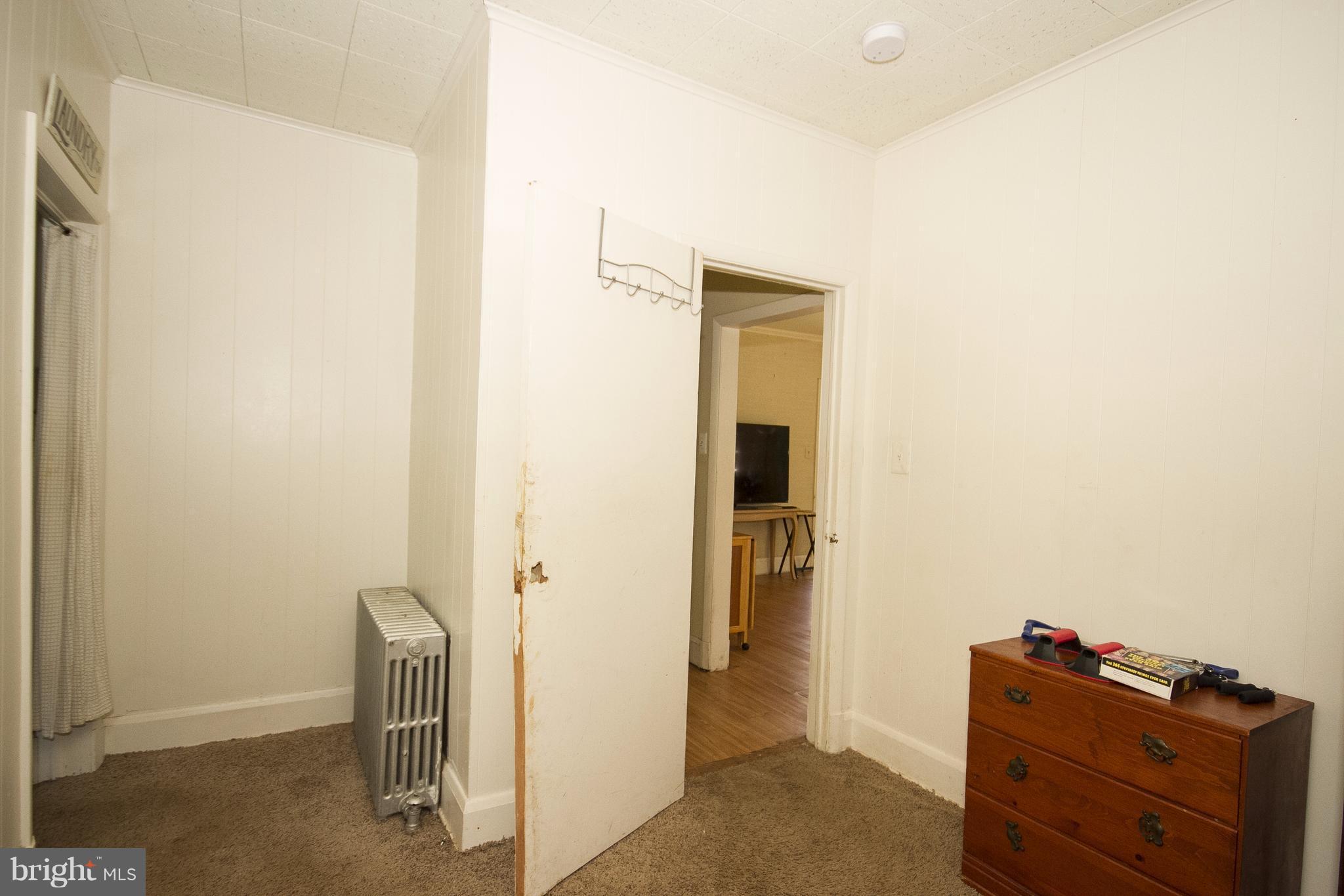 118 Byway Road Owings Mills, MD 21117 - Photo 14 of 25 a view of room with furniture and wooden floor