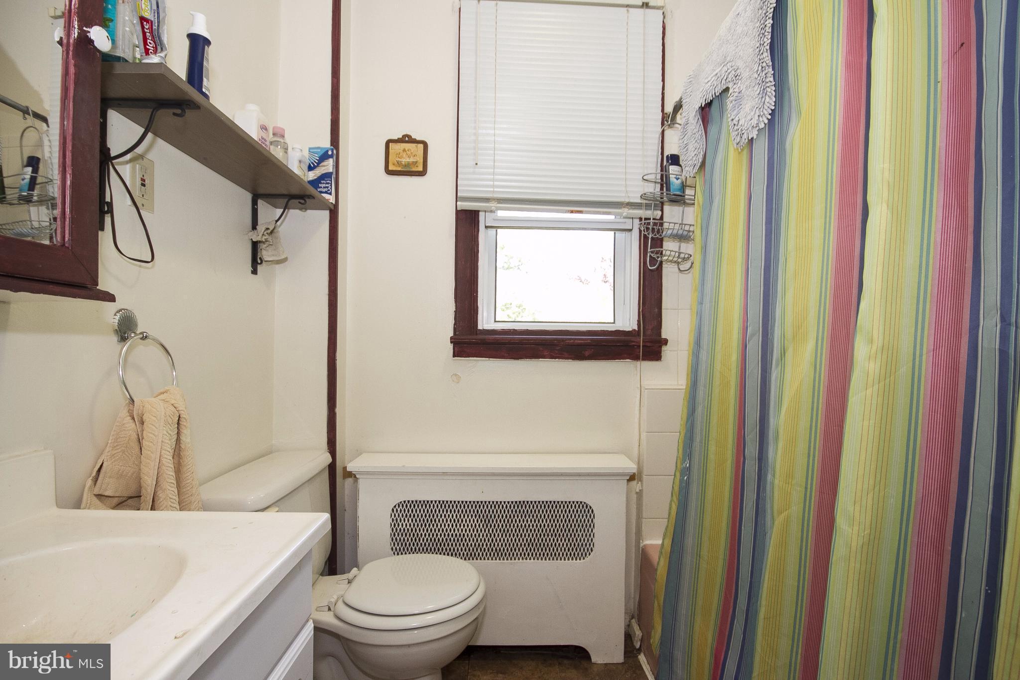 118 Byway Road Owings Mills, MD 21117 - Photo 17 of 25 a bathroom with a toilet a sink and a bathtub