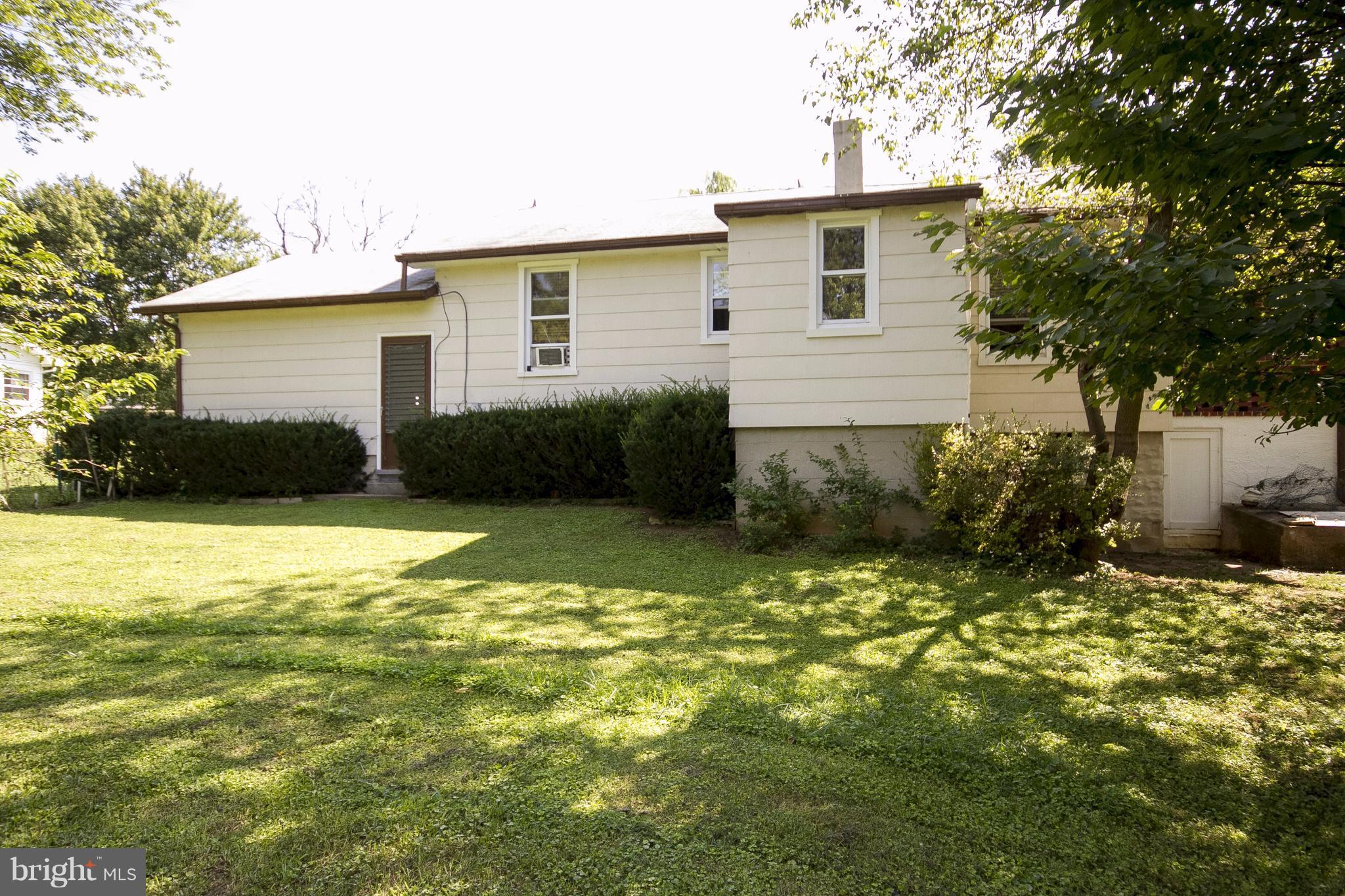 118 Byway Road Owings Mills, MD 21117 - Photo 24 of 25 a view of a house with a yard